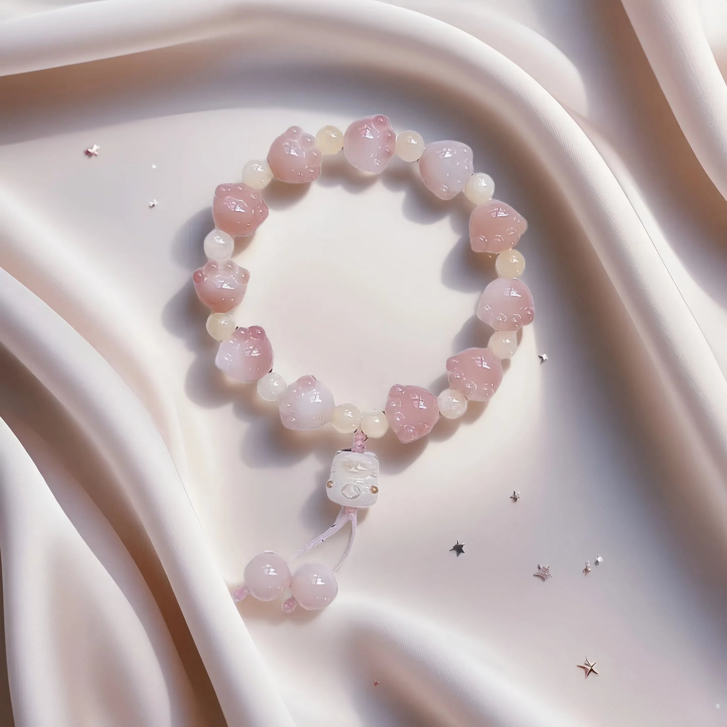 Bracelet Bodhi Taoé Pawfect : Pendentif patte de chat sculptée – Équinoxe de printemps Sakura rose 