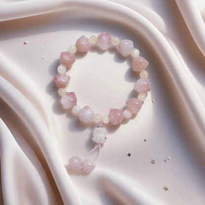 Bracelet Bodhi Taoé Pawfect : Pendentif patte de chat sculptée – Équinoxe de printemps Sakura rose 